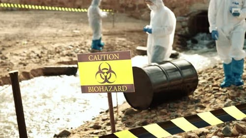 Scientists in Protective Suits Inspecting Biohazard Site