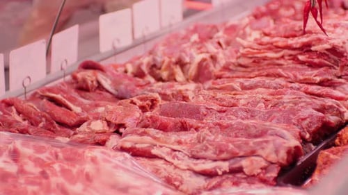 Raw lamb meat freshly brought to market for sale.