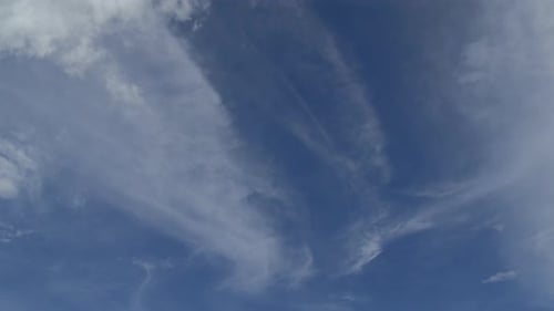 Clouds Drifting in a Blue Sky on a Sunny Day