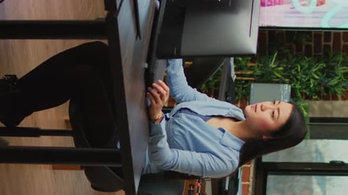 Vertical Video Artistic Creators Analyzing Graphics Industry Software on Computer