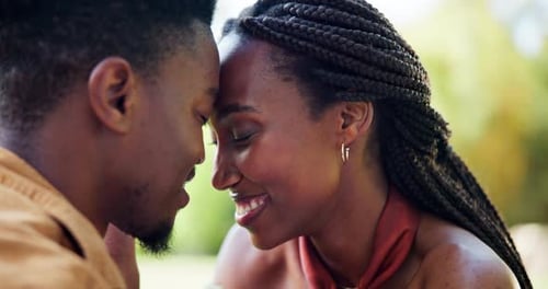 Romantic Couple Forehead to Forehead Smiling Together