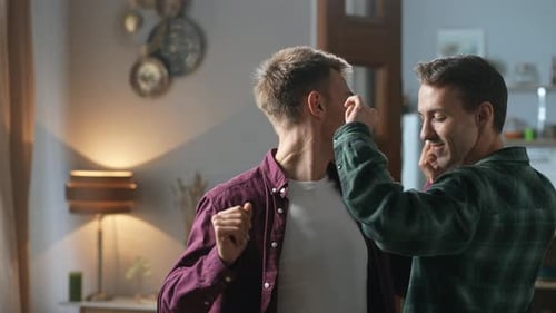 Gay Couple Dancing Affectionately in Home Environment