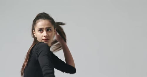 Video Clip of Pretty Young Girl Ballet Dancing Upper Body on Studio Background Slow Motion