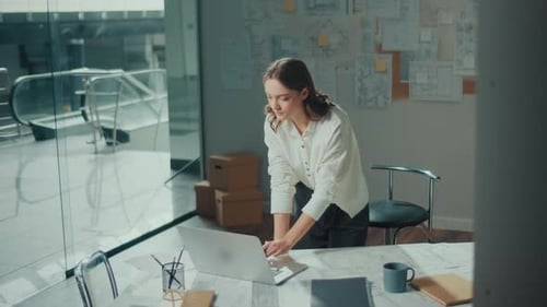 Female Architect in the Office Creates Sketches and Drawings of Future Buildings