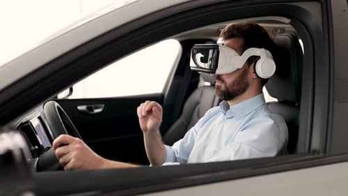 Man Wearing VR Goggles in Car