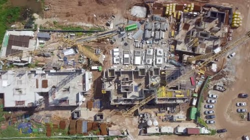 Large residential construction site with cranes, Aerial view