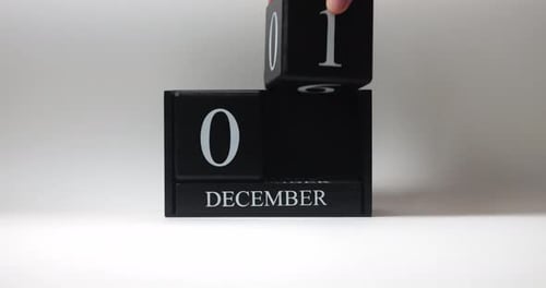 December 1st Date Displayed on Black Block Calendar