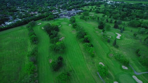 Aerial view of the golf terrain south of Chicago, highlighting the expansive green landscape.