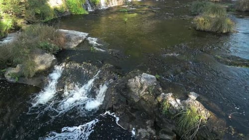 Freshwater Flowing Through The Cascade In Anllons River In Summer In Ponteceso, A Coruna, Spain. - a