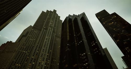 Modern City Skyscrapers with Reflective Windows on Cloudy Day