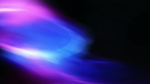 A person in a purple gown is standing in front of a purple background