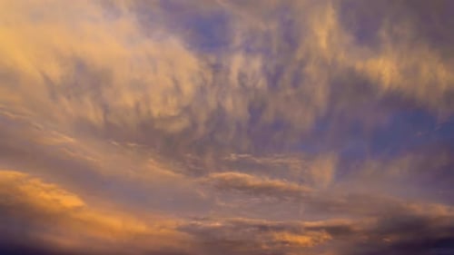Dramatic Clouds Glowing During Vibrant Sunset Time Lapse