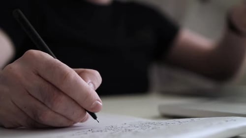 Creative Journaling: Man Working from Home Office