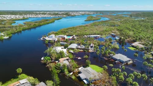 Heavy Flood with High Water Surrounding Residential Houses After Hurricane Ian Rainfall in Florida