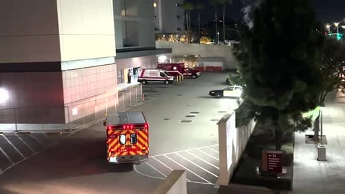 ambulance entering hospital with lights and sirens