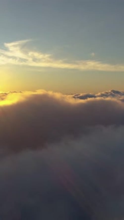 Sun Shining Above Dreamy Cloudscape Aerial