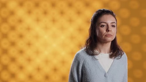Person Dressed in Casual Attire Standing Isolated Over Studio Background