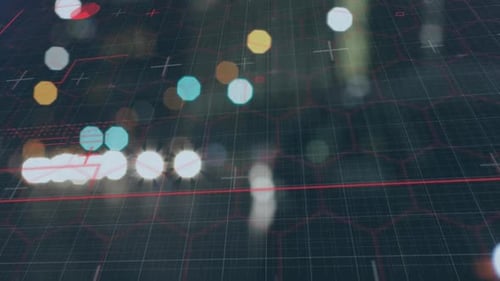 Animation of red glowing lines on network of hexagons with road traffic in background