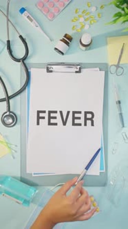 Medical Tools and the Word Fever, Overhead Shot