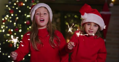 Happy Children Celebrating Christmas with Sparklers