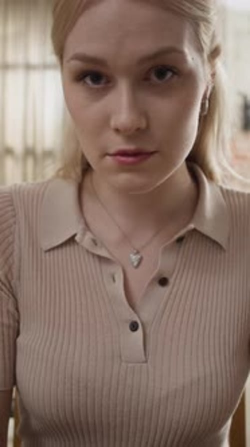 Woman Typing on Laptop Computer Indoors During the Day