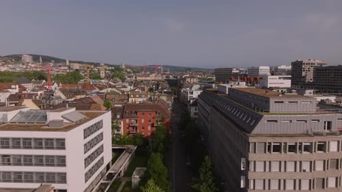 Forwards Fly Above Street in Urban Neighbourhood Multistorey Apartment Houses with Rooftop Terraces