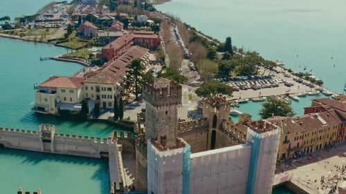 Drone shot over sirmione castle, Garda Lake, Italy
