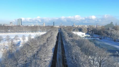 Snowy Urban Cityscape in Bright Winter Aerial View