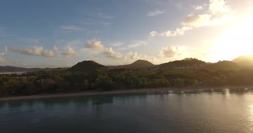 Aerial Drone Footage Martinique Le Marin St. Anne Beach in sunrise.
