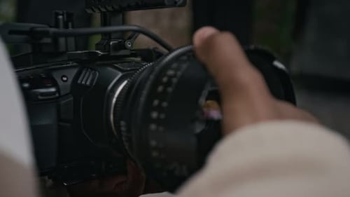 Attaching a Professional Camera Lens in an Urban Area