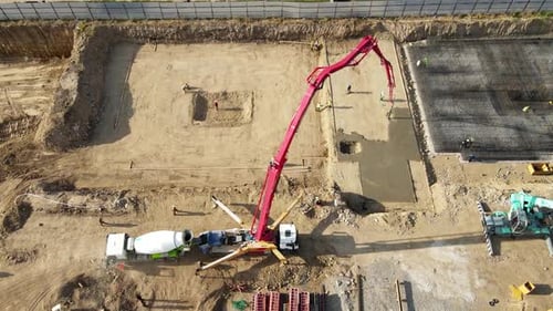 Concrete Mixer Pouring Foundation at Construction