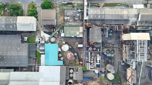 An aerial drone captures exterior of the paper and packaging factory.