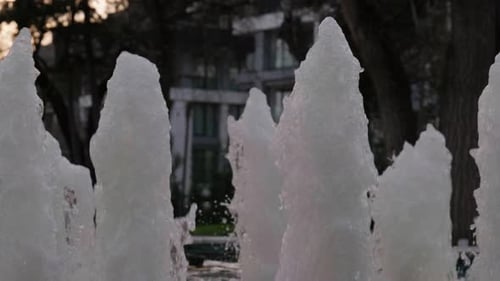 Upward Splashing Fountain Water in Slow Motion