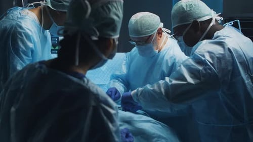 Surgical Team Performing Operation in Hospital Operating Room