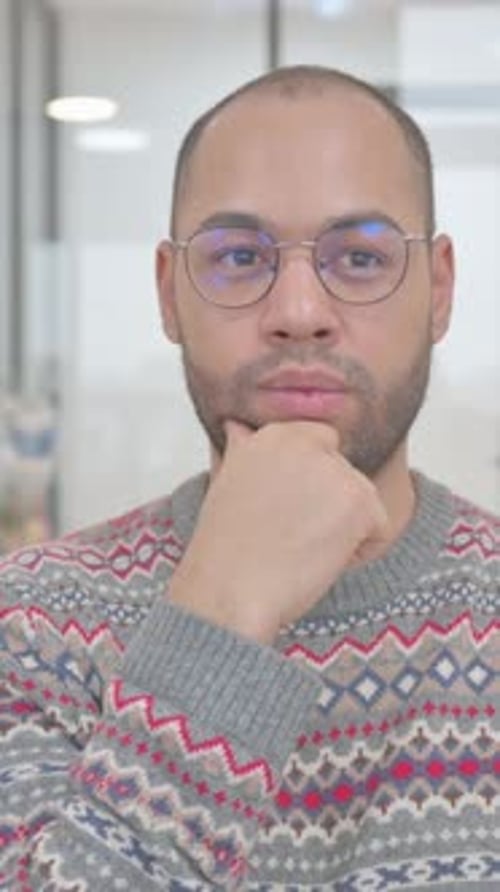 Thoughtful Young Man Having a Great Idea