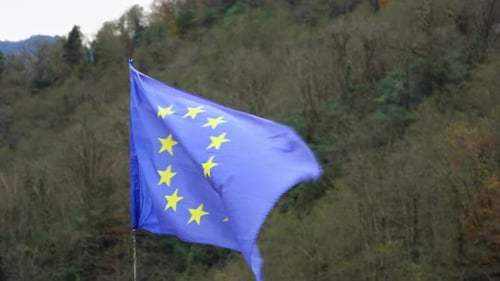 EU Flag Waving on a Cloudy Day