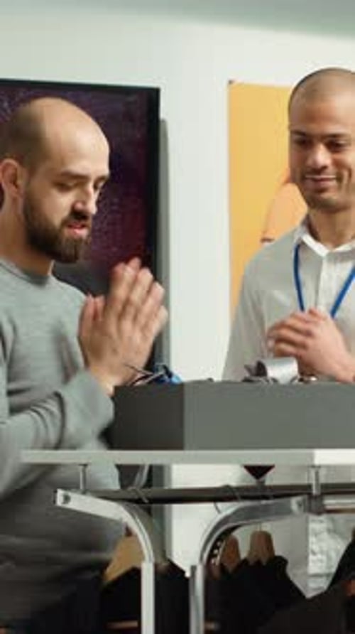 Man Shopping for Clothes in Stylish Clothing Store