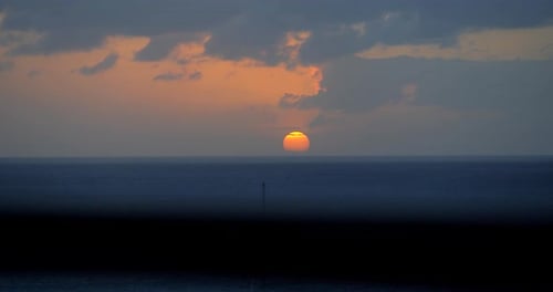 Incredible Ocean Sunset, Caribbean Sea Sun Over Horizon with Sailboat Aerial