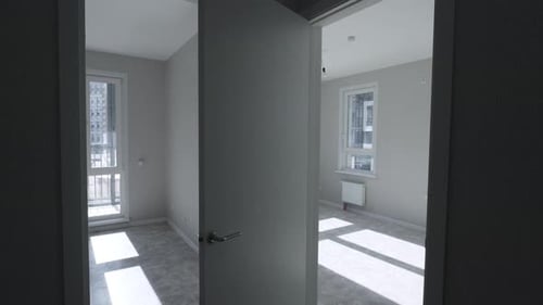 View Through Open Interior Doors Reveals Spacious Rooms