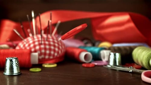 A Sewing Button Falls on the Table Filmed on a Highspeed Camera at 1000 Fps