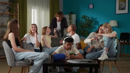 Group of friends in the living room together