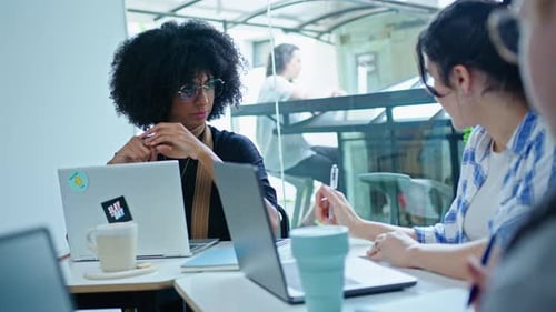 Team Collaboration During a Business Meeting