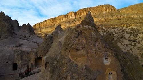 Aerial View of Ancient Cave City in Mountains