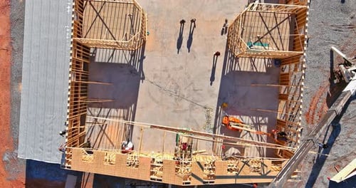 Aerial View of Building Under Construction on Sunny Day