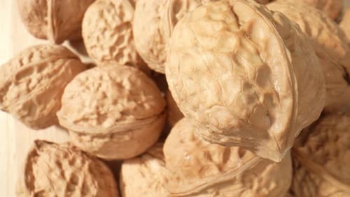 Close Up of Brown Shelled Walnuts Pile