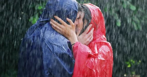 Romantic Couple Kissing in the Rain