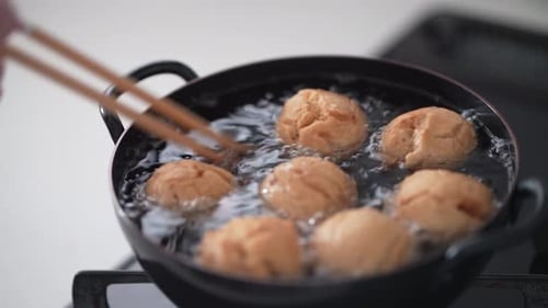 Making brown sugar sata andagi