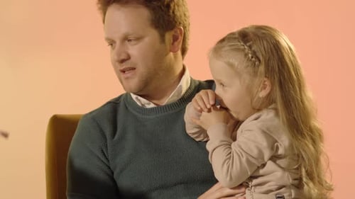 Loving Father Bonding with Two Daughters