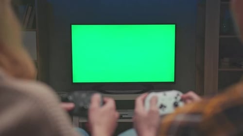Green Screen for Chroma Key of People Playing Video Game on Console Controllers