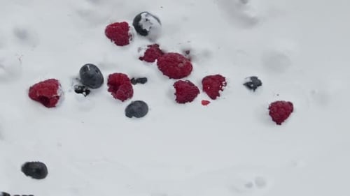 Berries Floating in Milk